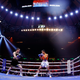 Katie Taylor of Ireland (black trunks) trades punches with Amanda Serrano of Puerto Rico (white trunks) for the World Lightweight Title fight at Madison Square Garden on April 30, 2022 in New York, New York.